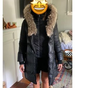Down coat with signature fur trimmed collar/hood